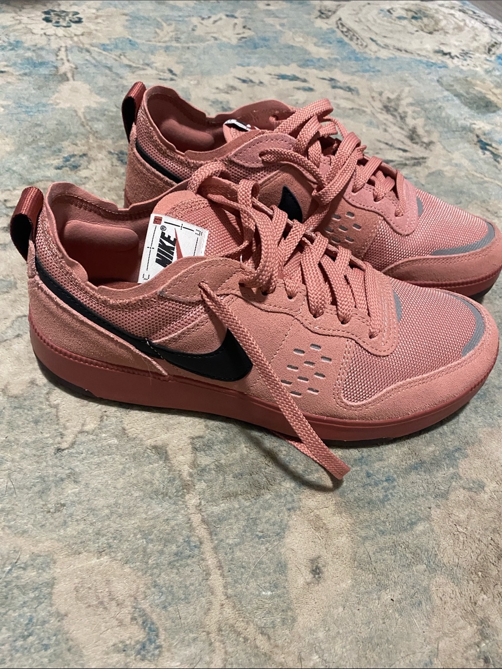 Nike Women's Rose Pink Low-Top Sneakers with Black Swoosh